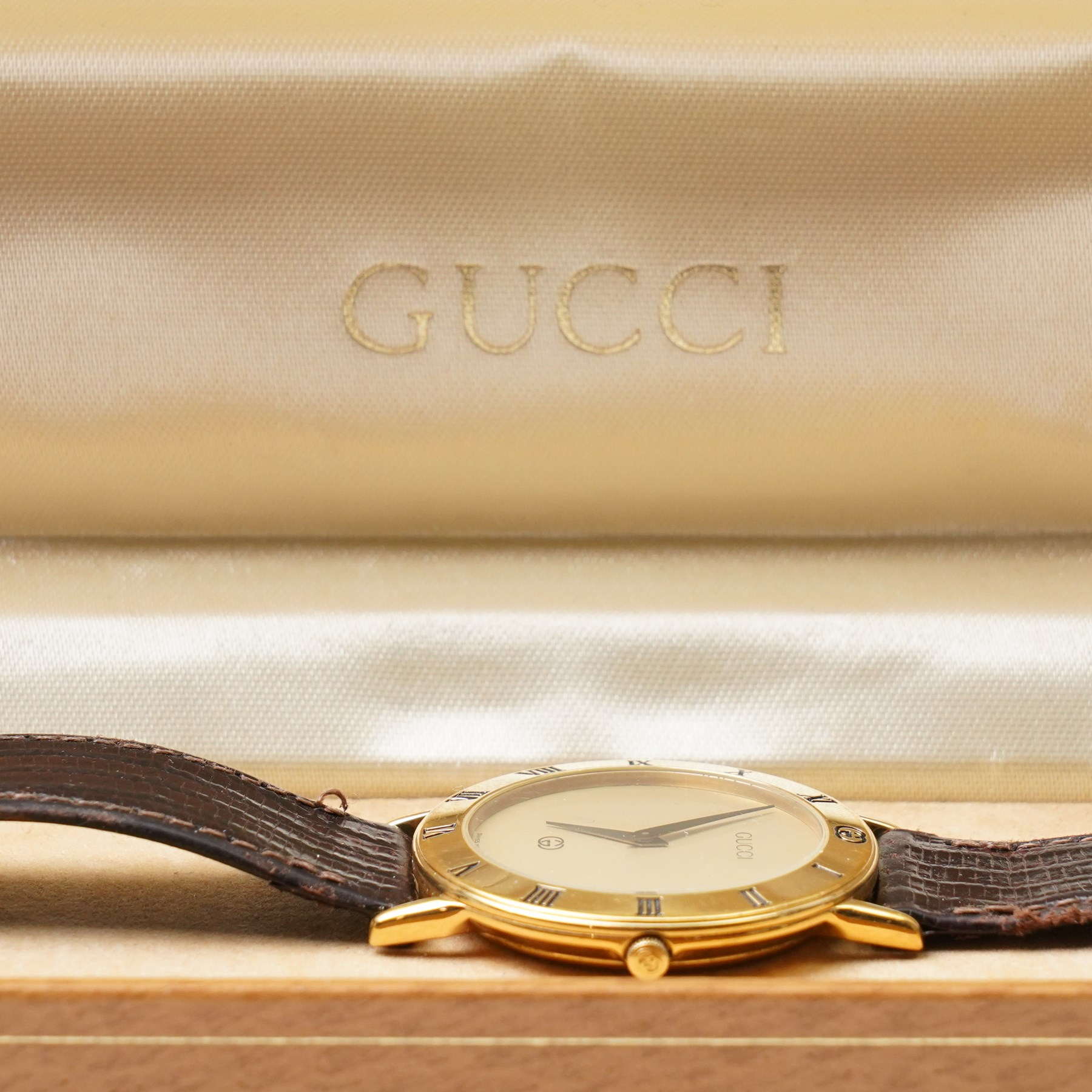 Gucci gold-plated wristwatch, Ref. 3000M, boxed