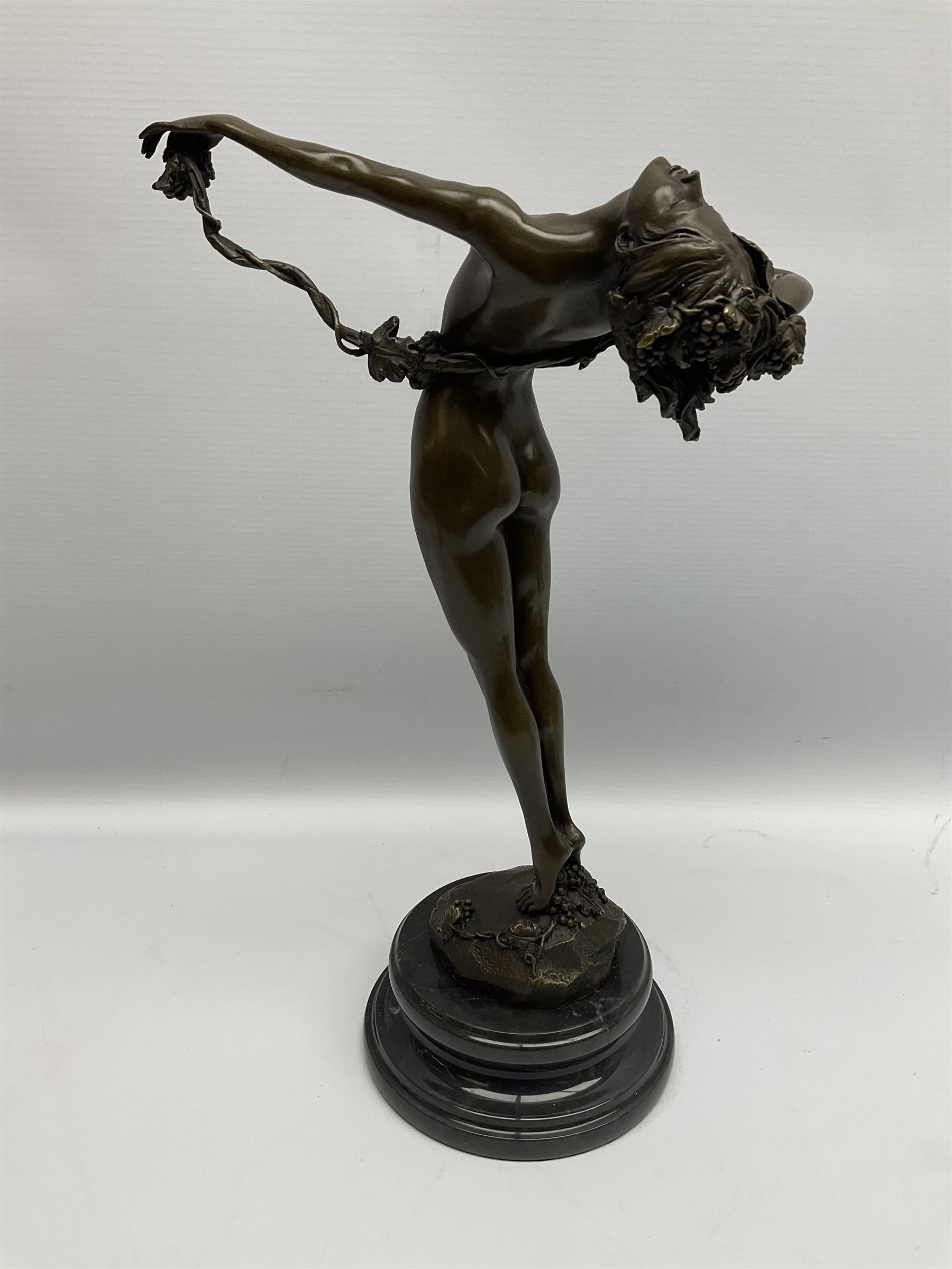 Bronze figure of a nude female holding a vine, after 'H. Frishmuth', with foundry mark on socle base, H38cm