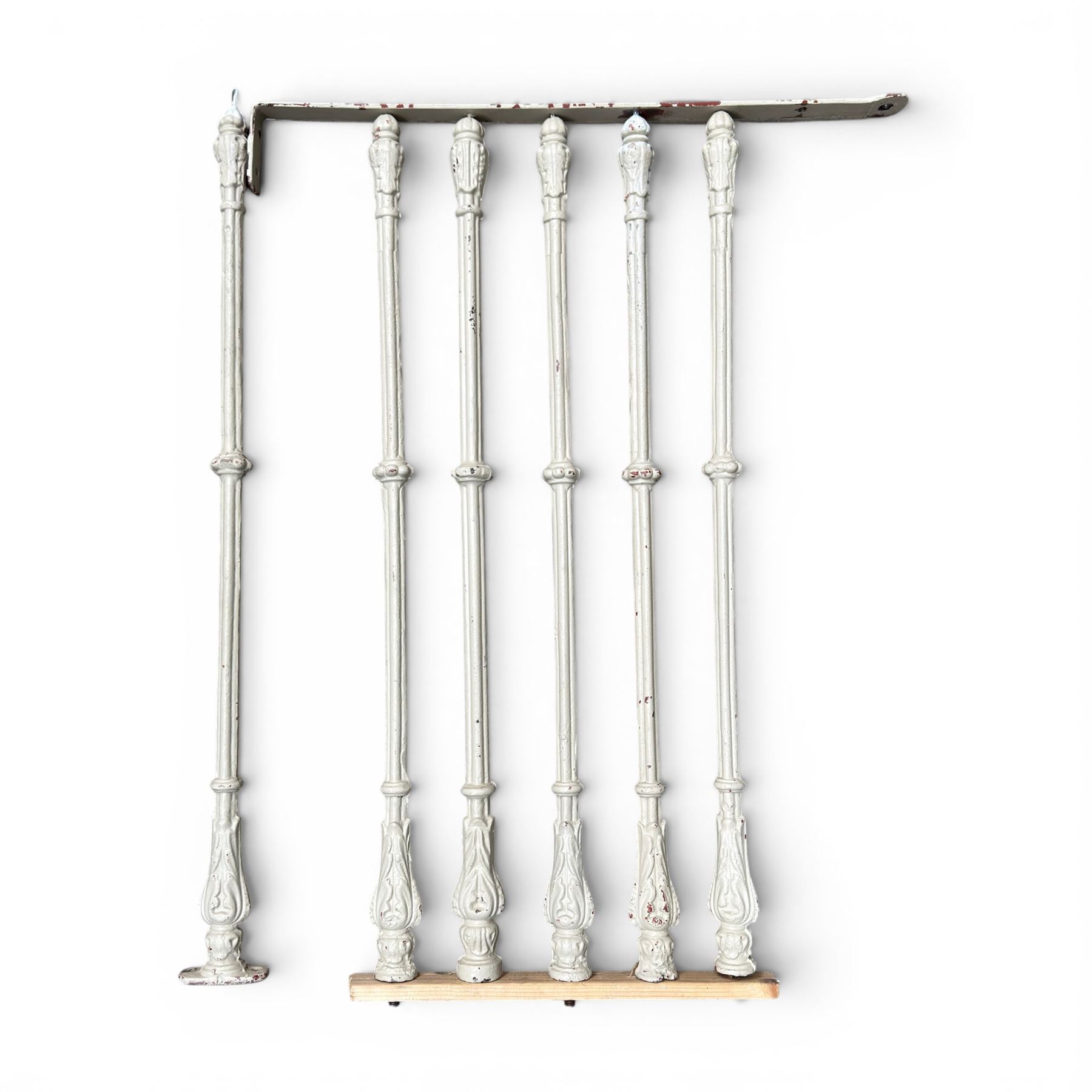 Victorian design cast iron spiral staircase, sixteen pierced treads, ornate balustrades, with landing and handrail painted in cream finish, height of pole 250cm, width of steps 74cm