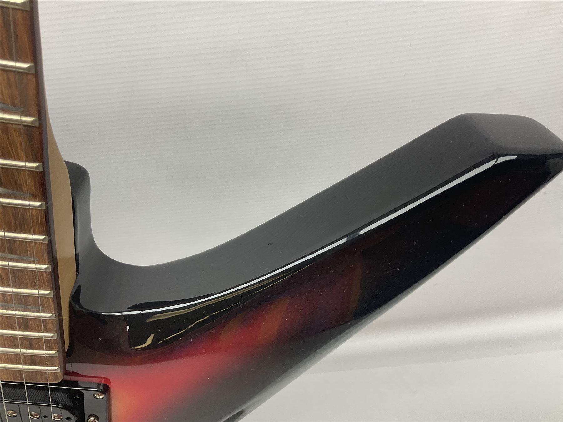 Jaxville X-Factor six-string electric guitar with three-tone X-shaped body L116cm overall.