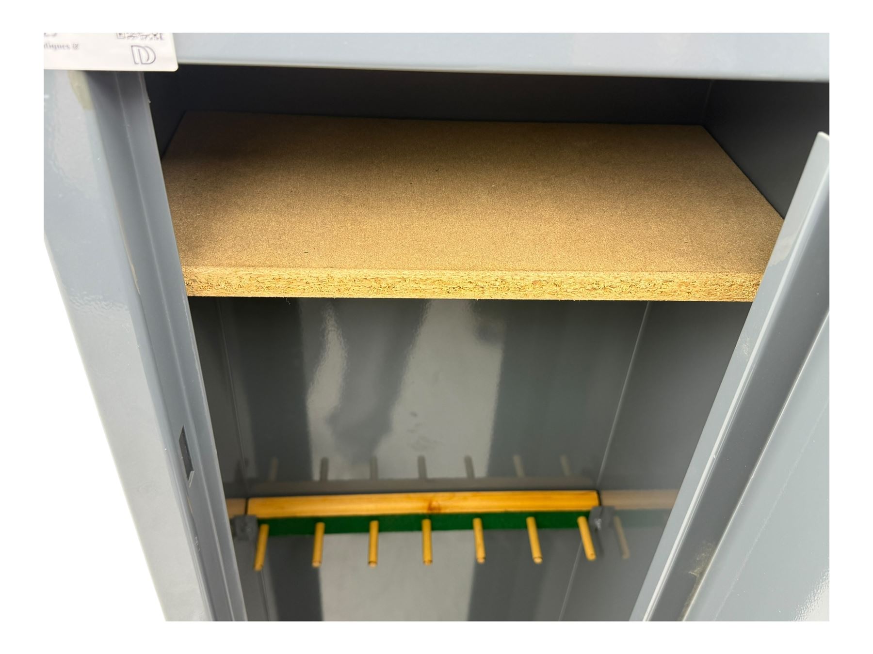 Mountain & Sowden Ltd - painted grey steel construction with single door secured by 7 lever lock, interior fitted with green felt-lined barrel rest, fixed shelf