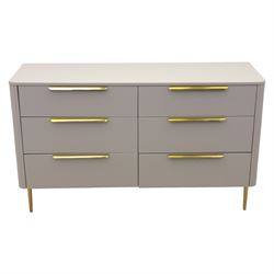 Made.com - 'Ebro' grey six drawer chest, gold painted metal shaped handles, rounded corners with fluted detail, raised on gold painted metal tapered supports