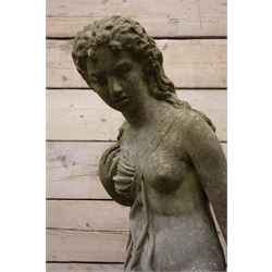  Composite stone garden sculpture of a semi-clad young Lady, on naturalistic circular base, H104cm   