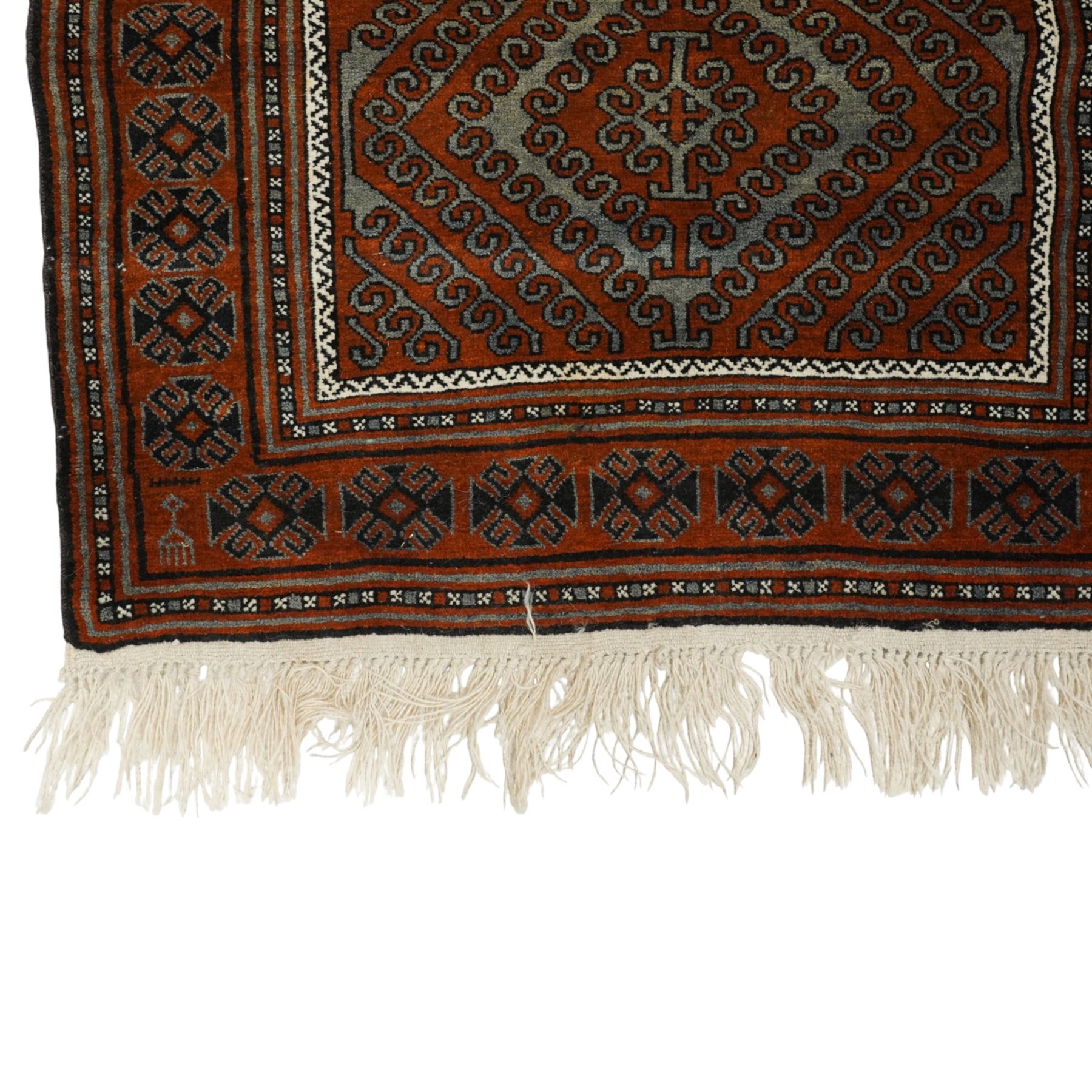 Afghan Turkmen Ersari hand-knotted rug, warm brown field decorated with a vertical arrangement of the elongated geometric guls formed by ram's horn hook motifs, enclosed by narrow ivory guard stripes, and a broad main border, with cotton fringe ends 