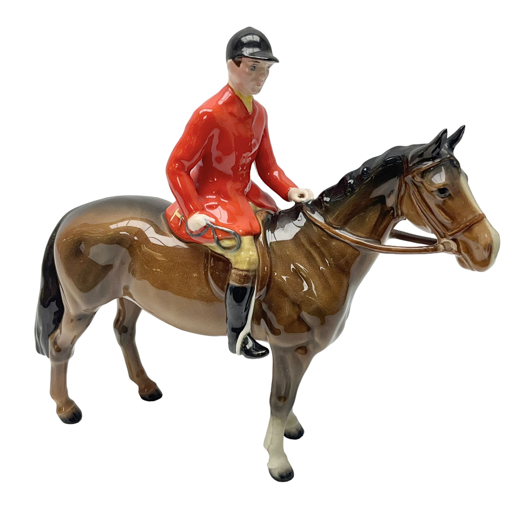 Beswick huntsman upon a bay horse no. 1501, with printed mark beneath, H22cm