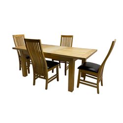 Light oak rectangular extending dining table, with additional leaf, and set four high back chairs with vertical slats and padded seats