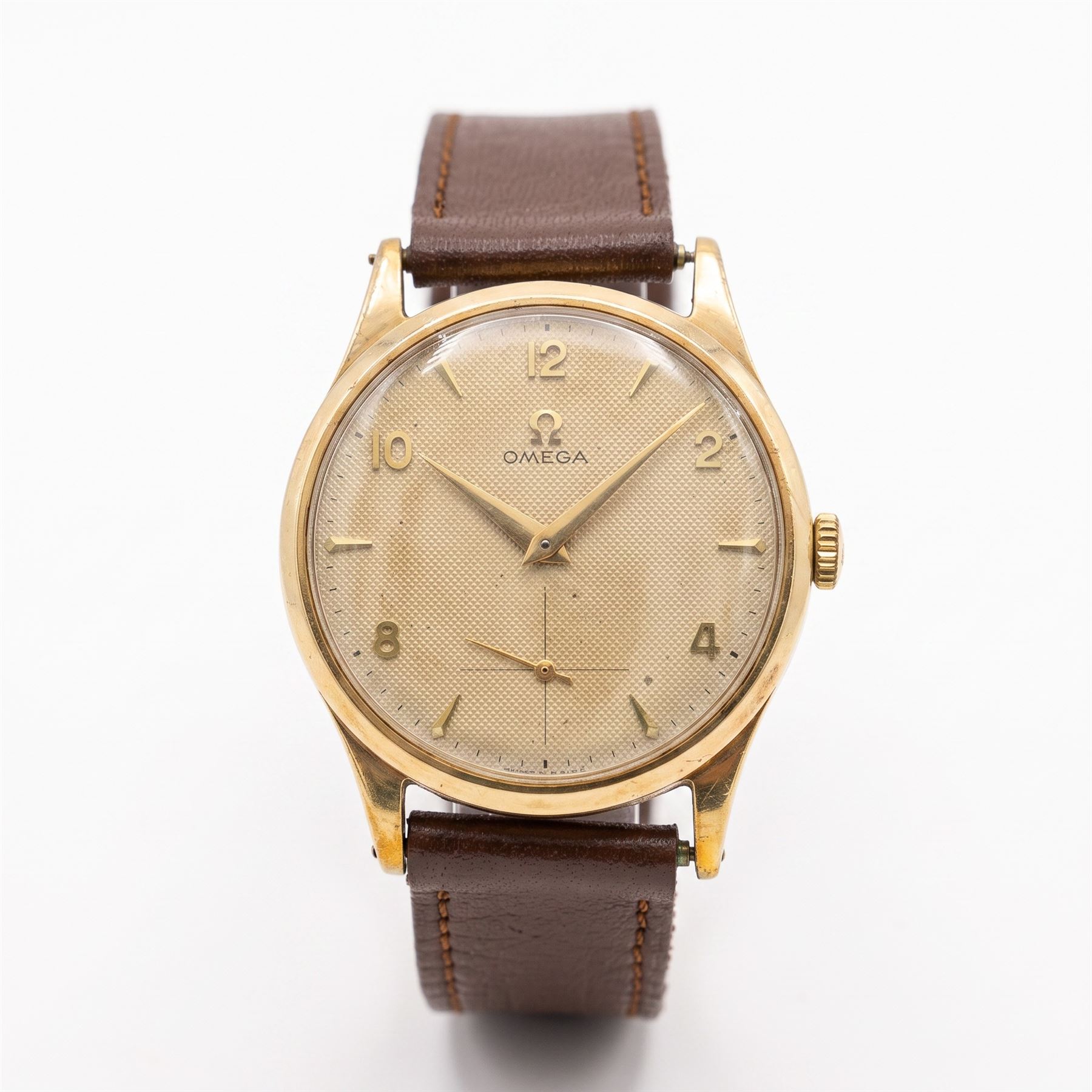 Omega gentleman's 9ct gold manual wind presentation wristwatch, Cal. 266, serial No. 14389766, cream textured dial with alternate dagger and Arabic hour markers and subsidiary seconds dial, Birmingham 1955, on brow leather strap
