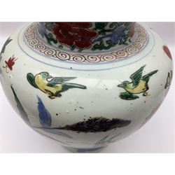 19th century Chinese Wucai vase and cover, decorated  with peacock on blue rockwork and other birds flying amongst tree peonies, H43cm