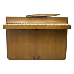 Louis Zwicki - mid-20th century oak cased compact piano, fitted with a folding music rest and full keyboard, dual brass pedals