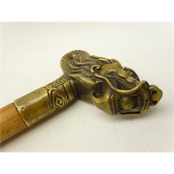  20th century hardwood walking cane, the brass pommel cast as a dragon, L99cm   