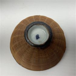 Chinese ceramic bowl, painted with floral and foliate decoration on a white ground, together with a similar much smaller Chinese bowl, painted with mountain scene to centre and covered by basket weave to exterior and a white metal mounted pear shaped scent bottle, largest bowl D11cm