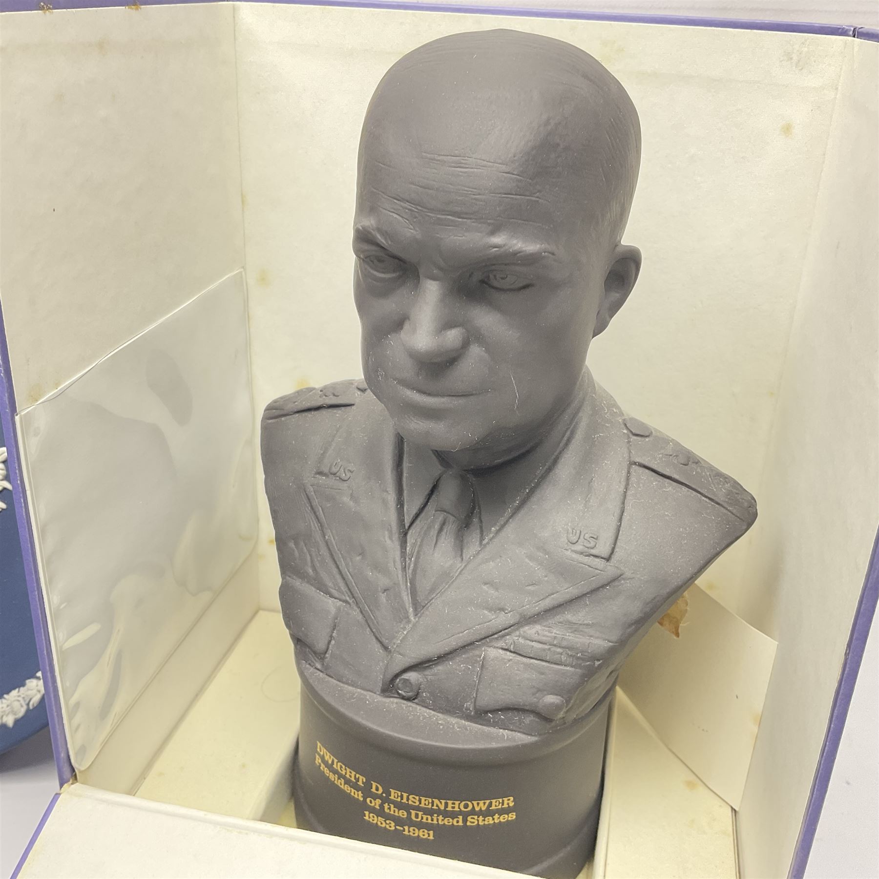 Collection of Wedgwood Jasperware, to include black Eisenhower Bust, two black basalt paperweights, one depicting an eagle and one depicting Julius Caesar, a blue Zodiac plate, Man on the Moon commemorative plate, American Independence Bicentennial plate and Royal commemorative ware, etc, all with impressed marks beneath, some with boxes