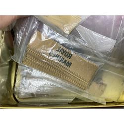 Quantity of military horse hair plumes and feather hackles, cloth stripes and regimental titles etc