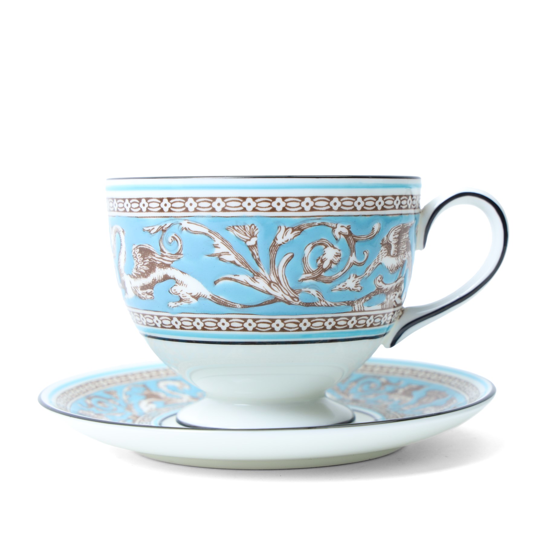 Extensive Wedgwood Turquoise Florentine part service tea, dinner and coffee service for six covers comprising six dinner plates, six dessert plates, six soup bowls and stands, pair of vegetable dishes and covers, gravy boat ad stand, oval meat plates, six tea cups and saucers, six coffee cans and saucers, six tea plates, teapot, coffee pot, sucrier and cover, sugar bowl, milk and cream jugs and cake plate, 72 pieces