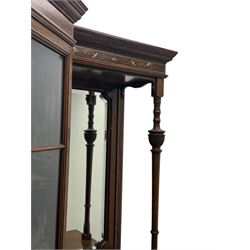 Victorian hardwood and inlaid display cabinet, central breakfront glazed display with astragal glazing and mirror back, flanked by mirrored alcoves with turned supports, below foliate and scrolling marquetry panels enclosing cupboard doors, shaped open shelves with turned supports beneath, on tapered and spade feet