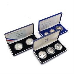 Three The Royal Mint silver proof collections or sets, comprising '50th Anniversary of the...