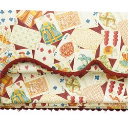 Late 20th century upholstered window pelmet with internal blind and side drapes, covered in a playing card patterned fabric with scalloped edging and red braid trim