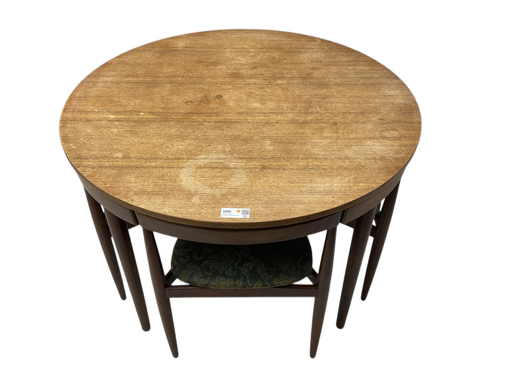 Hans Olsen for Frem Røjle - mid-20th century Danish teak 'Roundette' dining set, comprising a circular dining table raised on four tapering supports, paired with four matching chairs, each with a triangular seat upholstered in floral patterned fabric and raised on three tapering supports