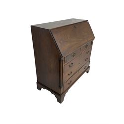 George III mahogany bureau, fall-front enclosing fitted interior, over two short and three long graduating drawers flanked by canted quarter columns, moulded lower edge over bracket feet