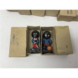 Collection of twenty two Robertson golly figures, H8cm