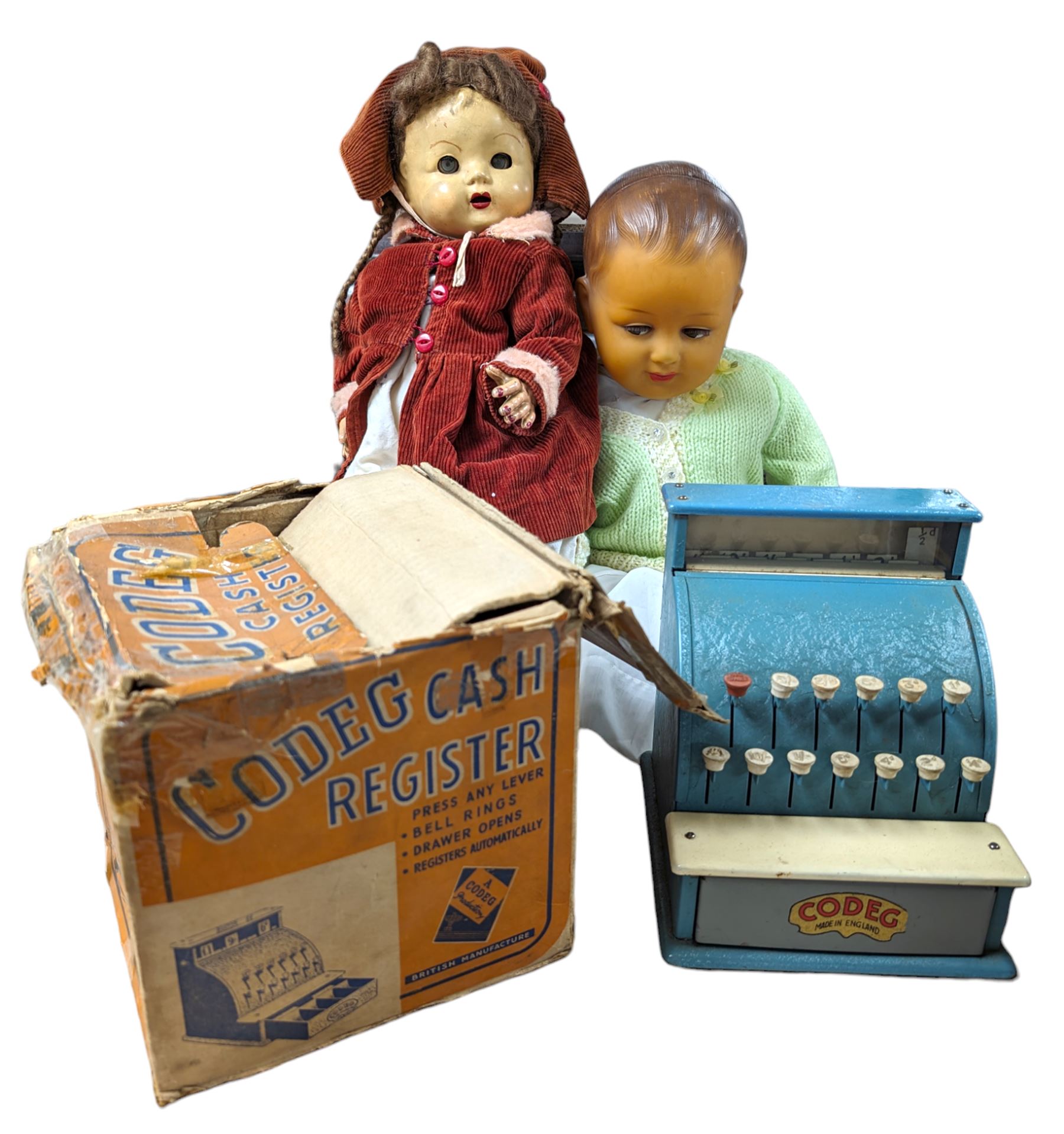 Codeg child's cash register, boxed, a 1930's Societe Nobel Francaise (SNF) doll and another vintage doll