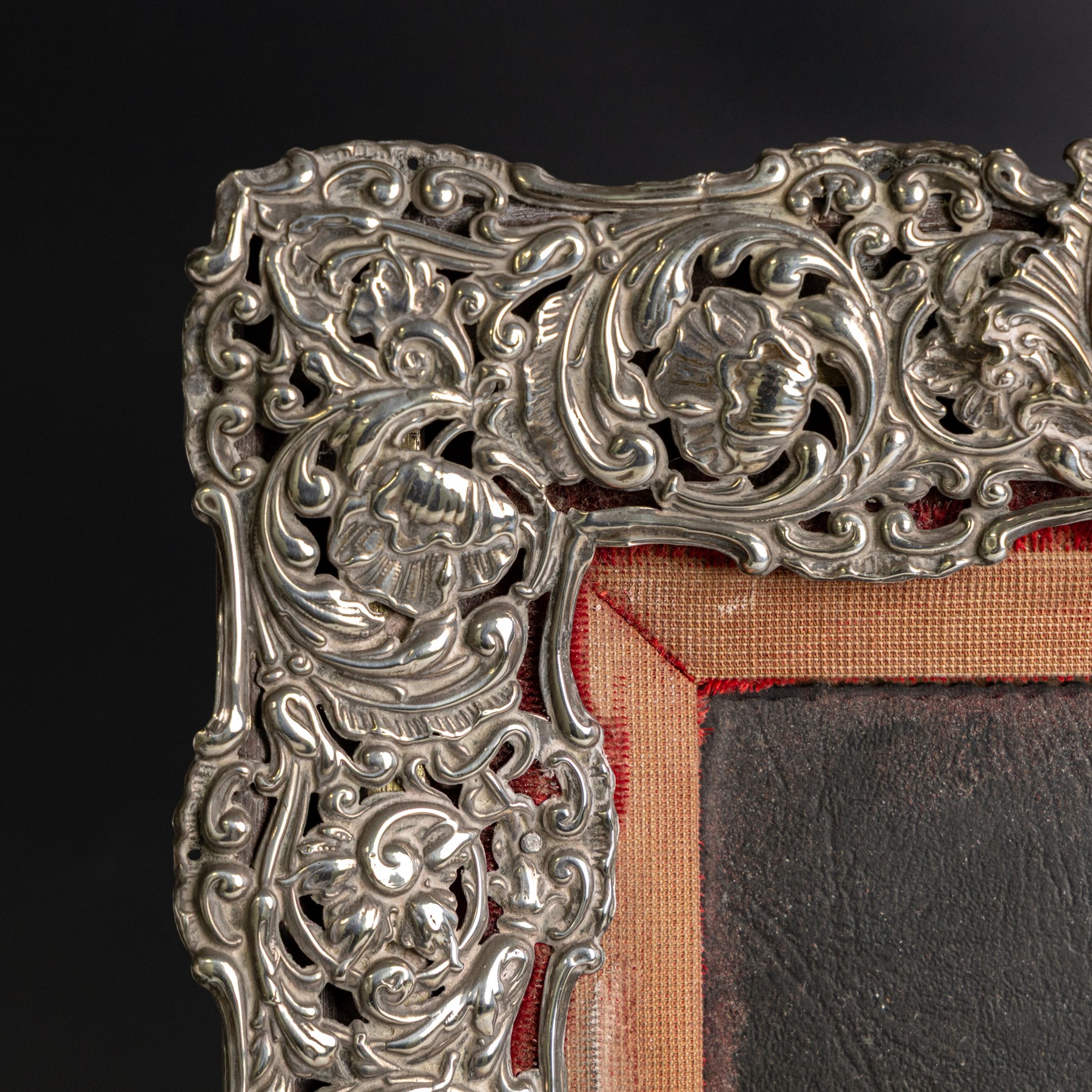 Edwardian silver mounted photograph frame, of rectangular form embossed with scrolling floral and foliate decoration, with easel support verso, hallmarked Henry Matthews, Chester 1905, H37cm