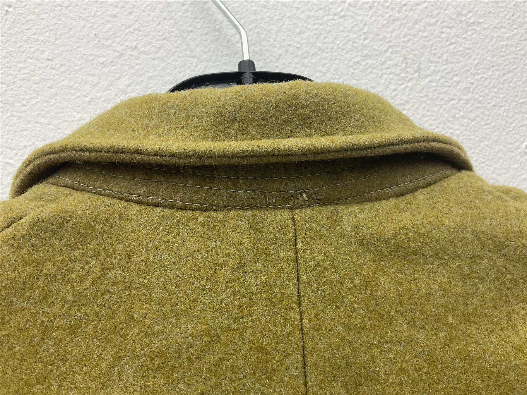 Japanese Type 38 winter tunic, the lining stamped with various Japanese character marks