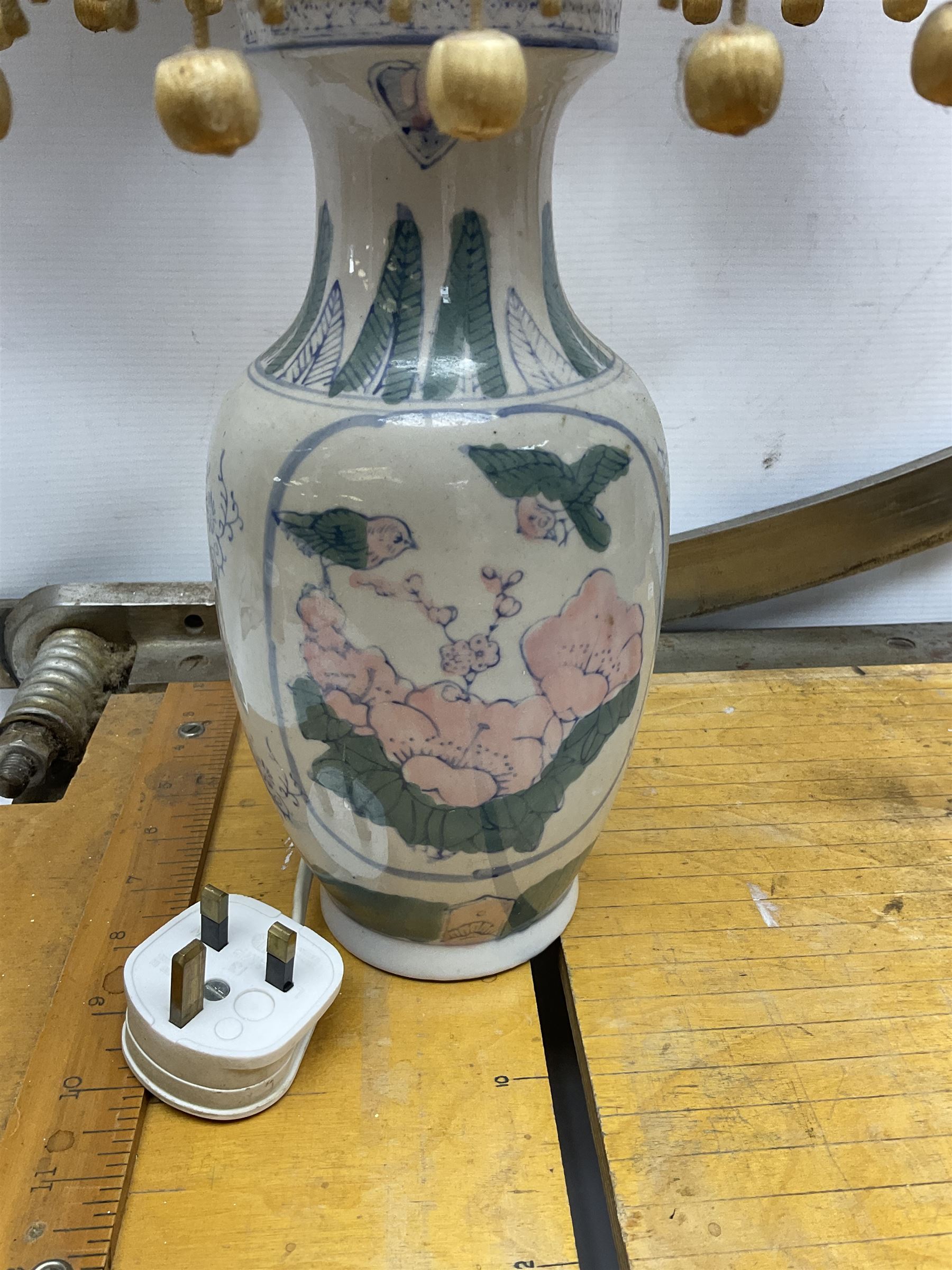 Coal bucket painted with flowers together with pair of bellows, boot scraper in the form of a beetle, wooden guillotine, composite table lamp with tassel lampshade and one other