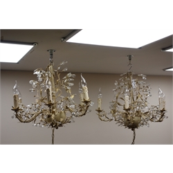  Pair of six branch French style cream metal finish chandeliers with prismatic drops, W61cm  
