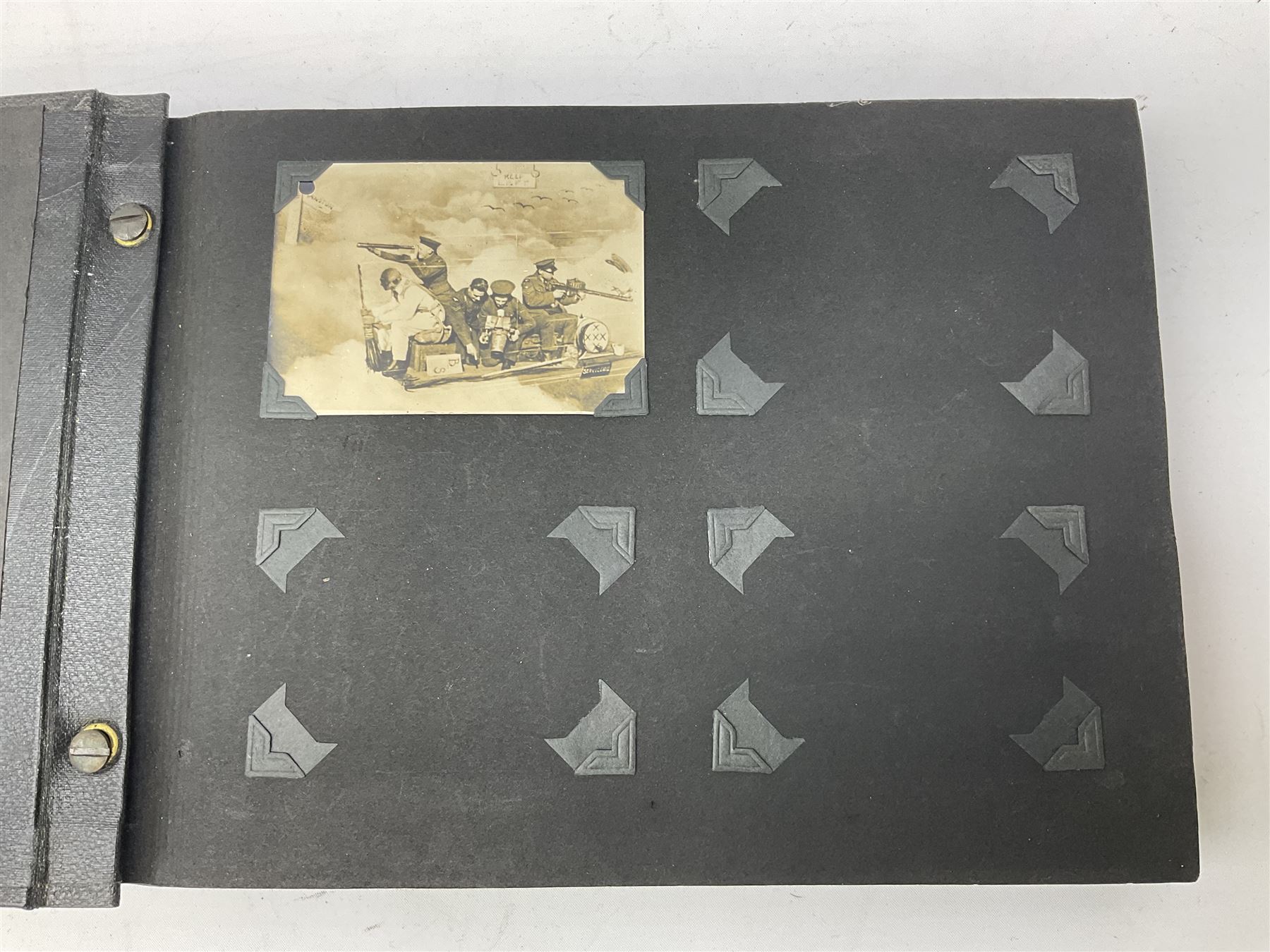 144 Squadron RAF - album containing over one hundred photographs and postcards of varying sizes including group shots, aircraft on the ground and in the air, German aircraft, crashes etc; sizes from 3.5 x 6cm to 16 x 21cm; and quantity of modern reference material
