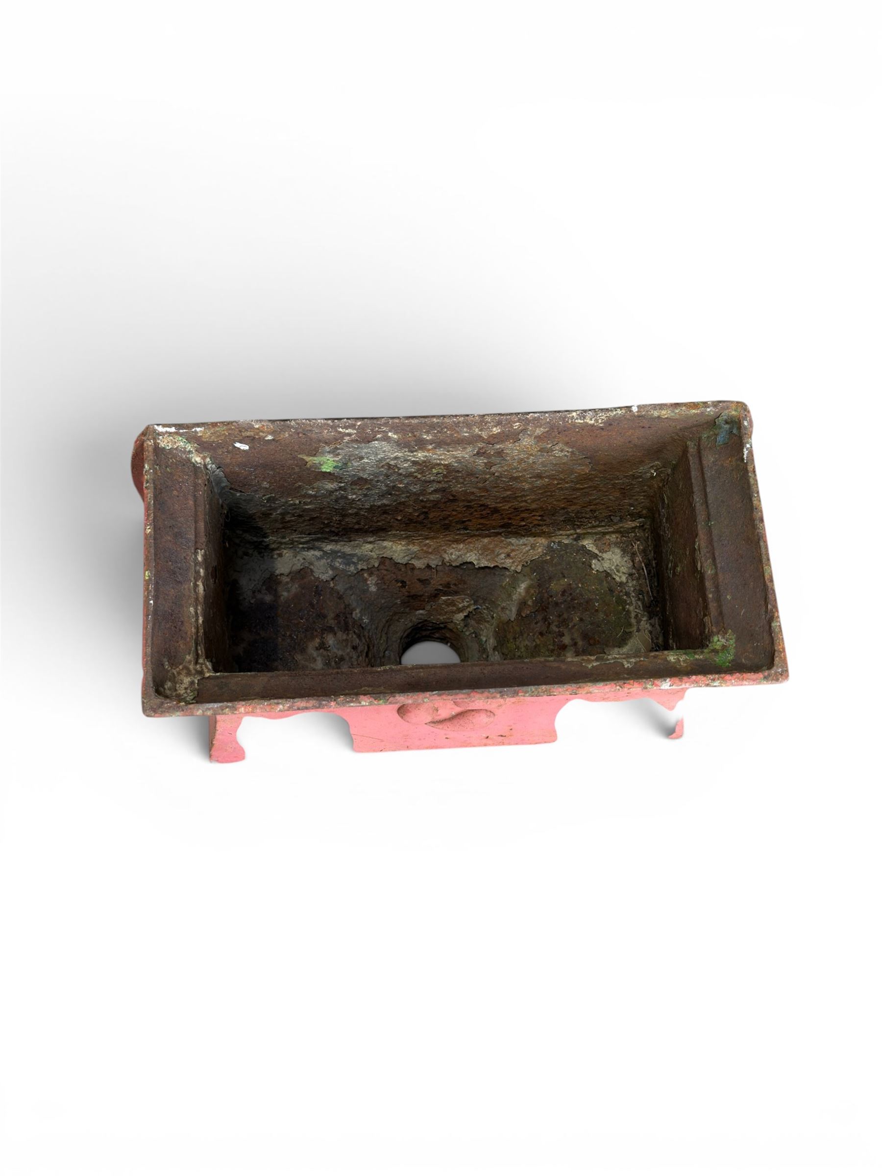 Edwardian heavy cast iron rainwater hopper, with water motif, painted in pale red finish