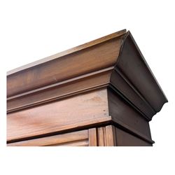 Victorian walnut dresser, projecting cornice over mirrored front, fitted with two short over two long drawers, on turned feet