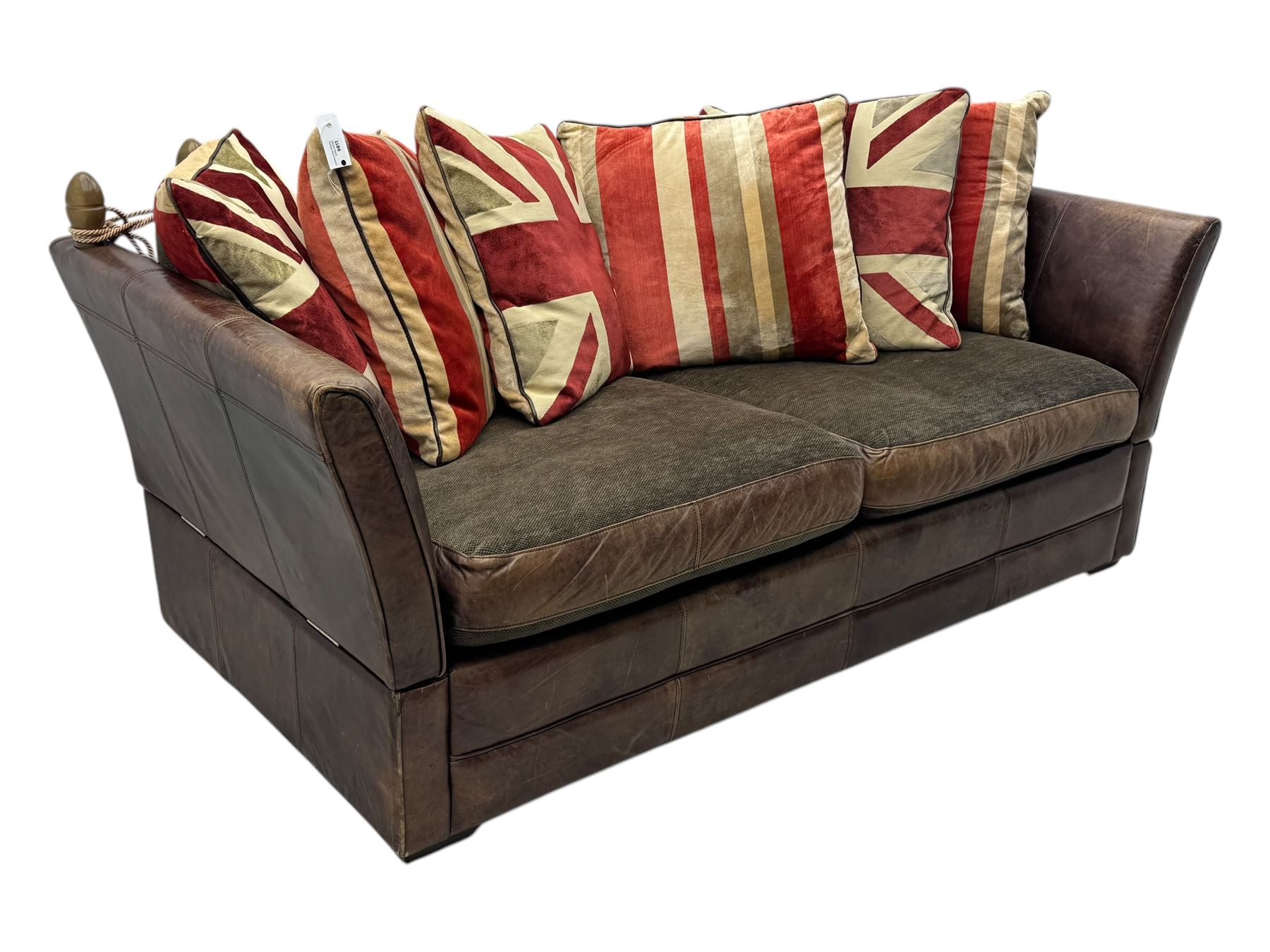 Large Knole design three-seat sofa upholstered in brown leather with scatter cushions upholstered in contrasting striped and Union Jack patterned fabric, on block feet (W210cm, H100cm, D102cm); together with matching rectangular footstool (135cm x 75cm, H45cm)