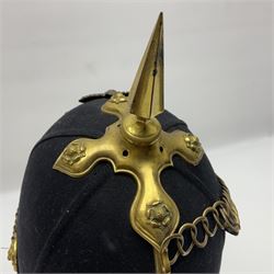 Late Victorian North Staffordshire Regiment Officer's Home Service Blue Cloth Helmet, having incorrect other ranks gilt metal Queen's crown helmet plate to the front with later leather backing, removable spike to the top on a shaped cruciform base with rosette fittings, rosette side bosses, brass trim to the front peak, and leather and velvet backed chin scales, with leather sweat band, the interior with makers stamp for Hawkes & Co 14 Piccadilly London