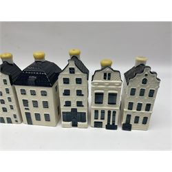 Twenty seven KLM Bols Blue Delft's decanters in the form of Dutch houses, some with contents