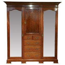 Edwardian mahogany triple combination wardrobe, the moulded cornice above a central panel ...