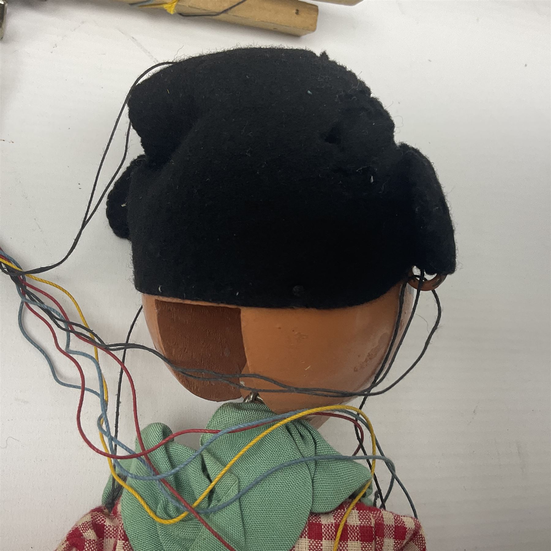 Pelham Puppet - a rare type SM Harlequin circa 1950s with painted black face mask, black felt hat, green ruff and red white chequered suit, H31cm; in original box with instructions 