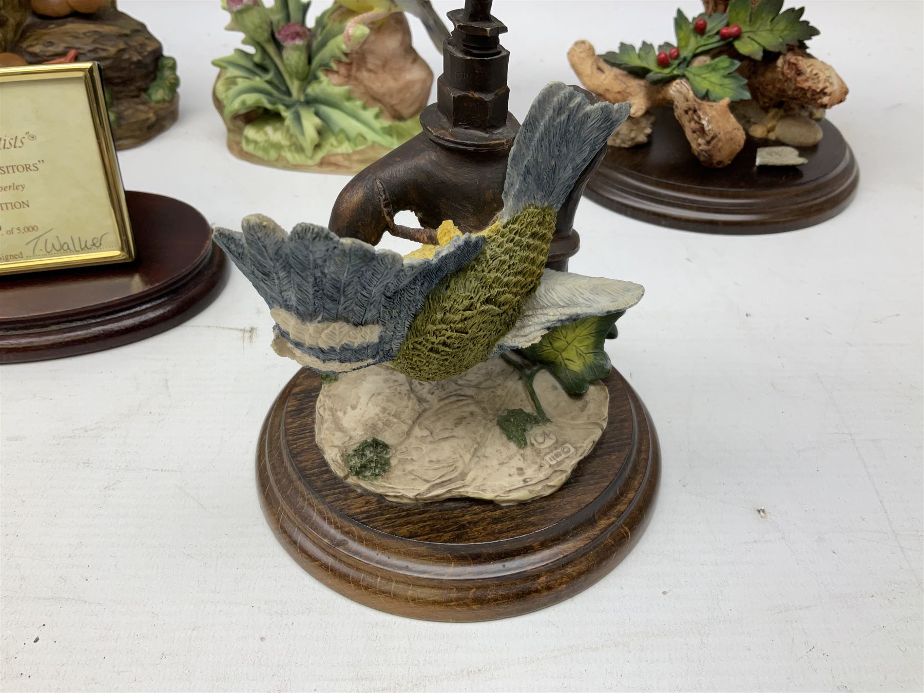 Three Country Artist figure groups, comprising 'Woodland Visitors', 'Bluetit on Tap' and 'Blackbird', together with two other animal figure groups