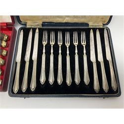 Set of six stag horn handled knives by Cooper Brothers and Sons, together with a set of silver plated dessert knives and forks for six place settings, both within fitted cases