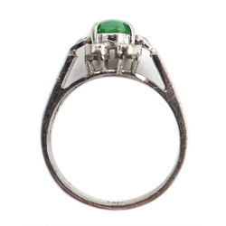  White gold cabochon oval jade and four stone diamond ring, stamped 14K  