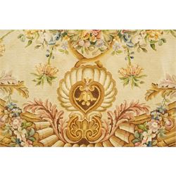 20th century French Aubusson style circular carpet, cream ground of Savonnerie design with scrolling floral and scallop motifs