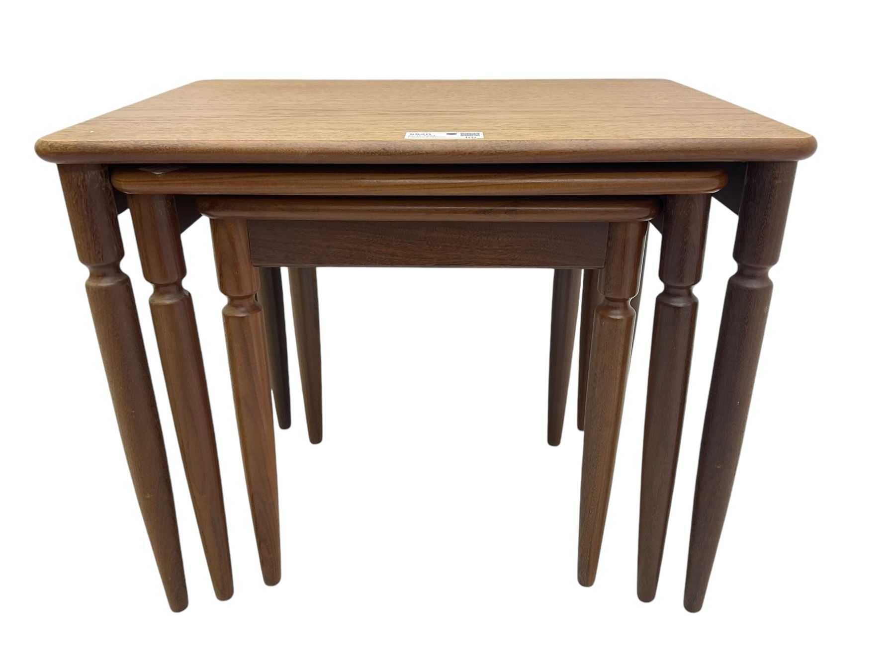 G-Plan - teak nest of three tables, rectangular top raised on turned supports
