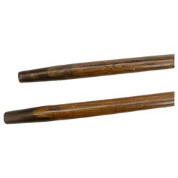 Pair of Halberds, with steel ends and wooden shafts, L245cm
