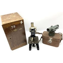 Black finished monocular microscope by Prior London No. 17372,  with pitchfork base and rack and pinion focusing, in original fitted wooden case with additional lenses, H32cm, together with Watts dumpy level, no. 116249, in a leather case