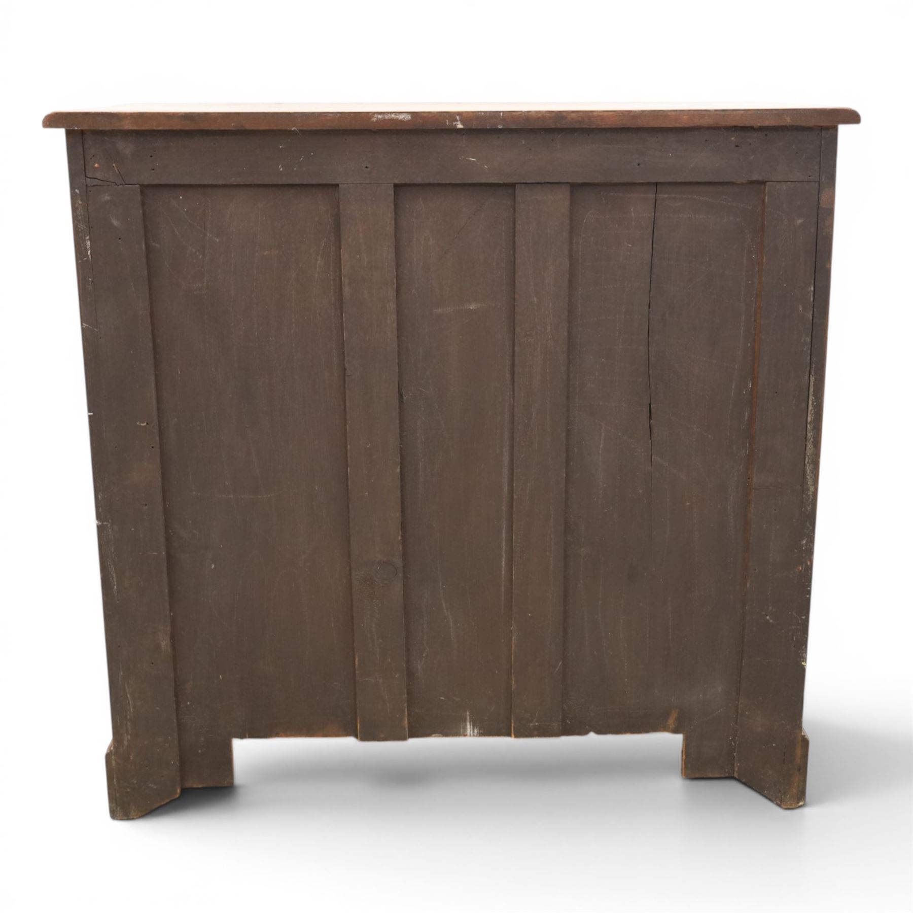19th century mahogany chest, two short over three long drawers with pierced brass handles, raised on bracket feet 