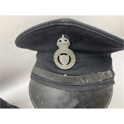 Hull City Police - helmet with king's crown night plate; two further ball-top helmets with Queen's crown plates; and a peaked cap (4)