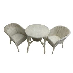 Lloyd Loom - white painted circular table (D69cm, H70cm); and pair of two armchairs (W54cm)