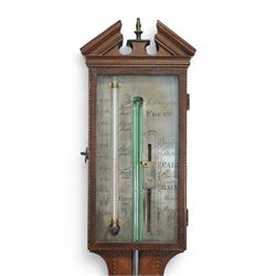 Stampa- George III early 19th-century mercury stick barometer in a mahogany case with a broken pediment and round base, case with chequered inlay to the edge and cistern cover, visible full length bulb cistern tube recording barometric air pressure from 27 to 31 inches with predictions, rectangular silvered register and vernier, with a spirit thermometer indicating the temperature in degrees Fahrenheit.
Mercury present in good condition.
Stampa is recorded as working in London as a barometer and looking glass manufacturer.