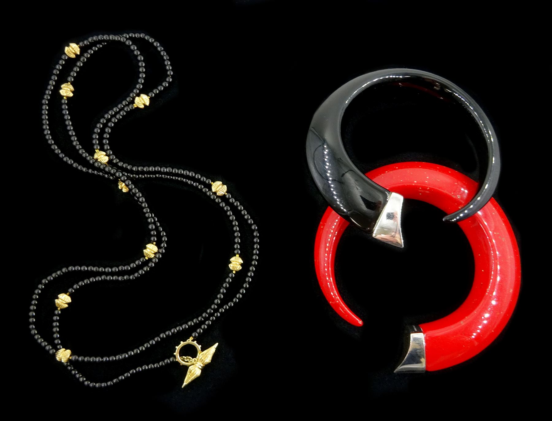 Shaun Leane silver red resin Tusk bangle, one other black Tusk bangle, both hallmarked a silver-gilt black bead wrap bracelet, all by the same hand