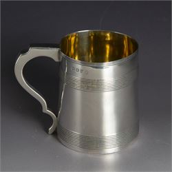 George III silver christening mug, of cylindrical tapering form, with banded decoration and scroll handle, the body with later presentation engraving, hallmarked London 1799, maker's mark worn and indistinct, H8cm